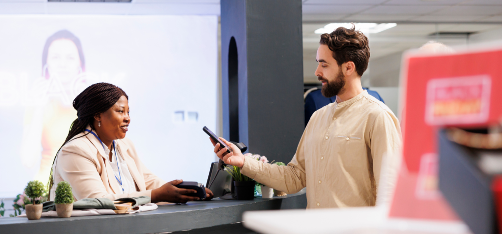 A person used his smartphone to pay the bill at a hospital with NameDrop applications